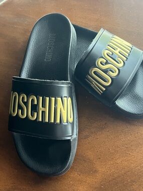 Moschino Black Slides with Raised Gold Logo